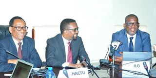 Kassahun Follo, the general secretary of HACTU, his deputy Omar Faruk Osman and Alexio Musindo