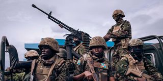 Soldiers walk at Goma Airport in eastern DRC